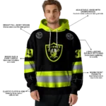 customized-las-vegas-raiders-safety-motif-black-neon-green-hoodie-best-selling