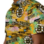boston-bruins-hawaiian-shirt-flamingo-retreat-gold-best-selling.webp