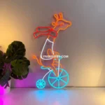 Animals Pets Neon Sign Giraffe Riding Bicycle 1