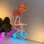 Animals Pets Neon Sign Giraffe Riding Bicycle 1